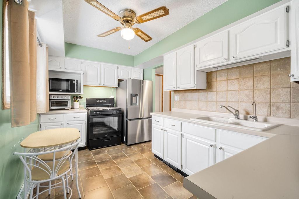 Photo of 11834 W Greenfield AVENUE, West Allis, WI 53214 (MLS # 1946094)