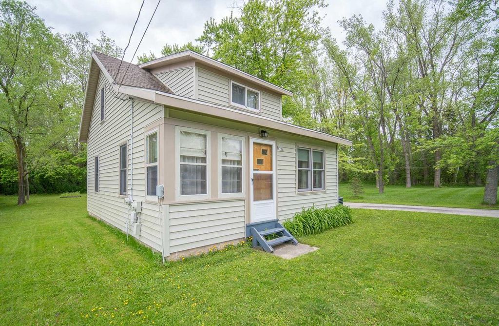 Photo of 7180 N River ROAD, West Bend, WI 53090 (MLS # 1964030)