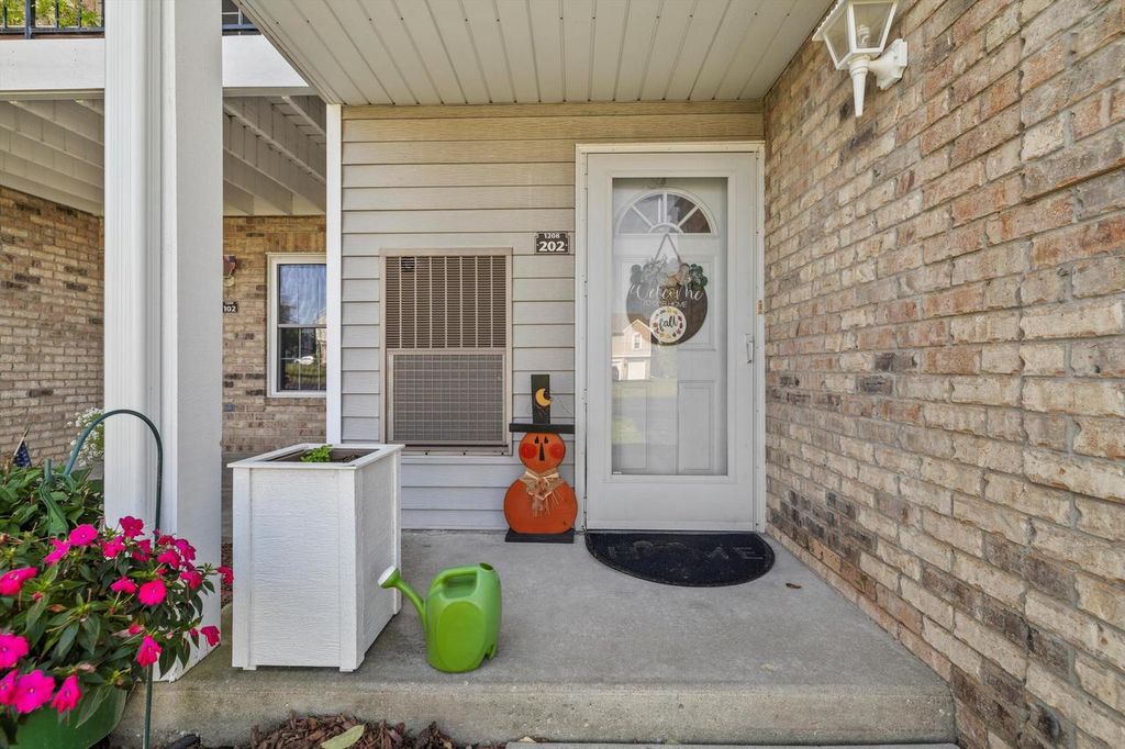 Photo of 1208 N Sunnyslope DRIVE #202, Mount Pleasant, WI 53406 (MLS # 1937018)
