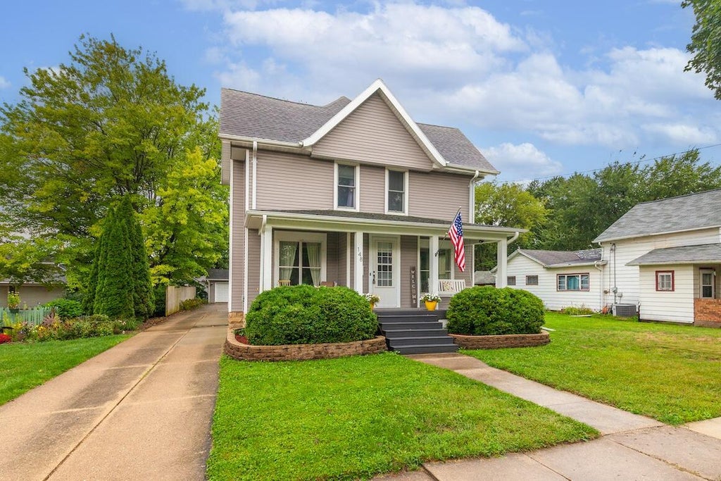 Photo of 148 E Washington STREET, Lake Mills, WI 53551 (MLS # 1979436)