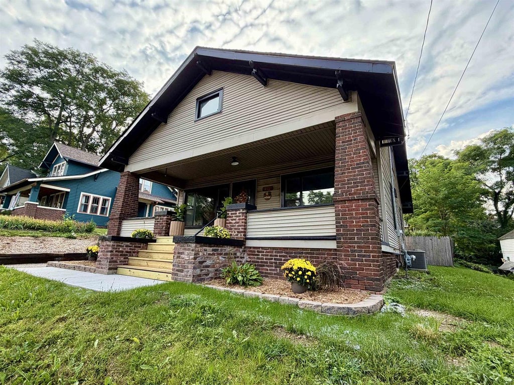Photo of 310 E Centerway, Janesville, WI 53545 (MLS # 2031826)