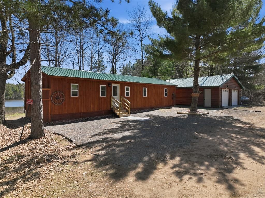 Photo of W7339 Pair O Lakes ROAD, Spooner, WI 54801 (MLS # 1600368)