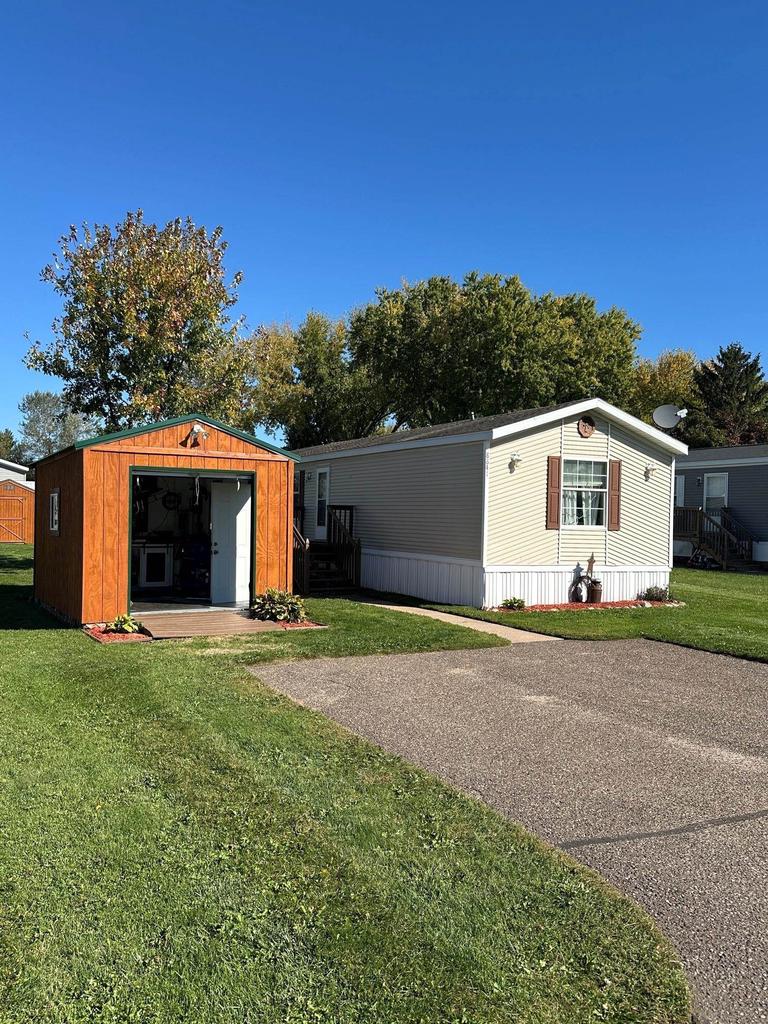 Photo of 8841 Green Acres MHC CT #8841, Fall Creek, WI 54742 (MLS # 2034504)