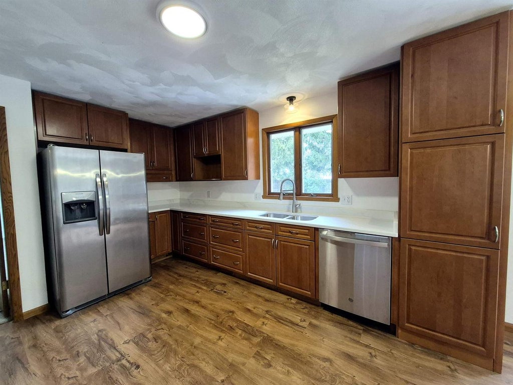 Photo of 1212 N Wuthering Hills DRIVE, Janesville, WI 53546 (MLS # 2033961)