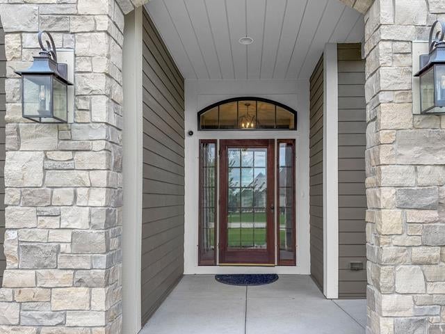 Photo of N18W24703 Still River DRIVE, Pewaukee, WI 54072 (MLS # 2031901)