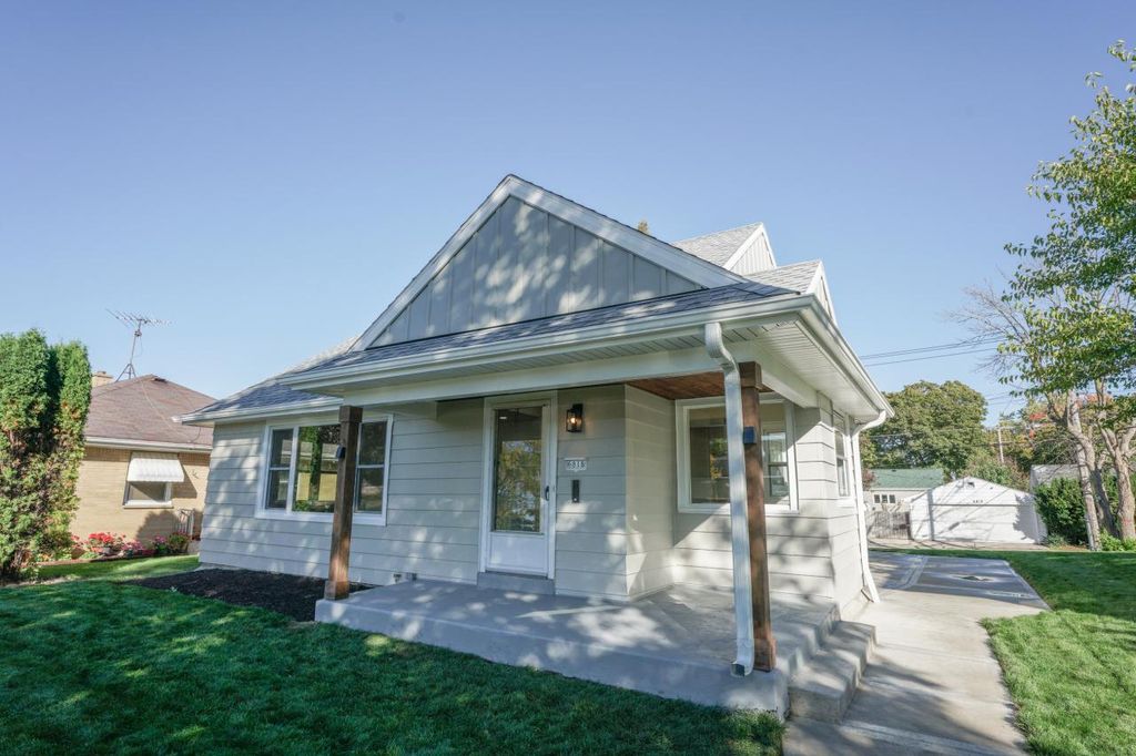 Photo of 6818 W Morgan AVENUE, Milwaukee, WI 53220 (MLS # 1939368)