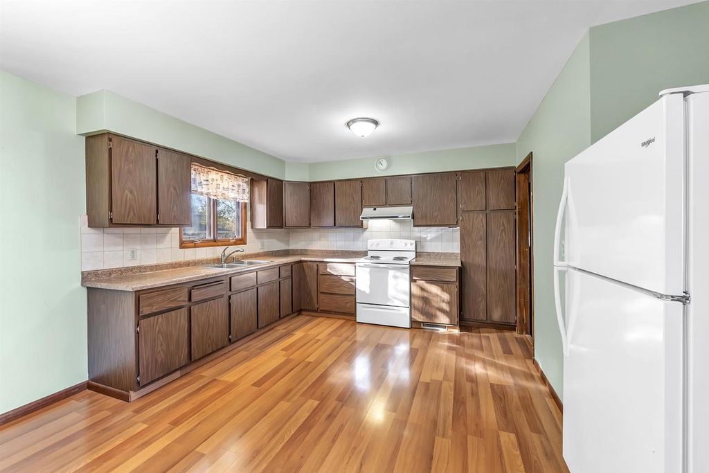 Photo of 314 Center STREET, Oconto, WI 54153 (MLS # 50318365)