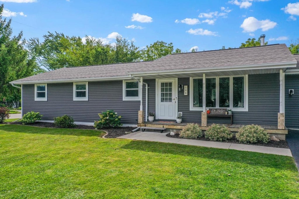 Photo of 198 E Green Bay STREET, Pulaski, WI 54162 (MLS # 50332846)