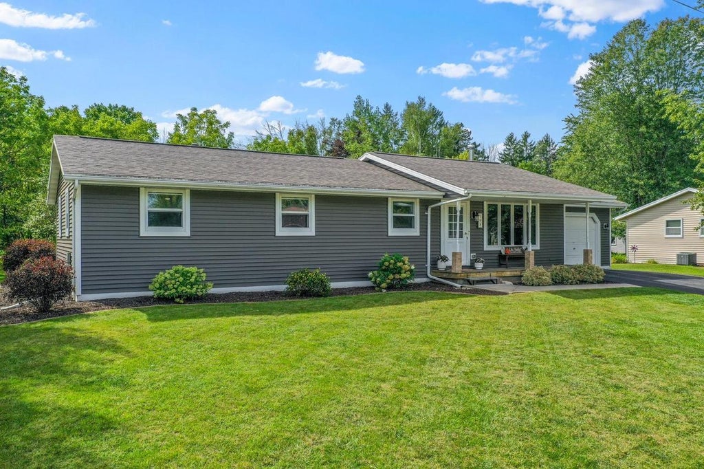Photo of 198 E Green Bay STREET, Pulaski, WI 54162 (MLS # 50332846)