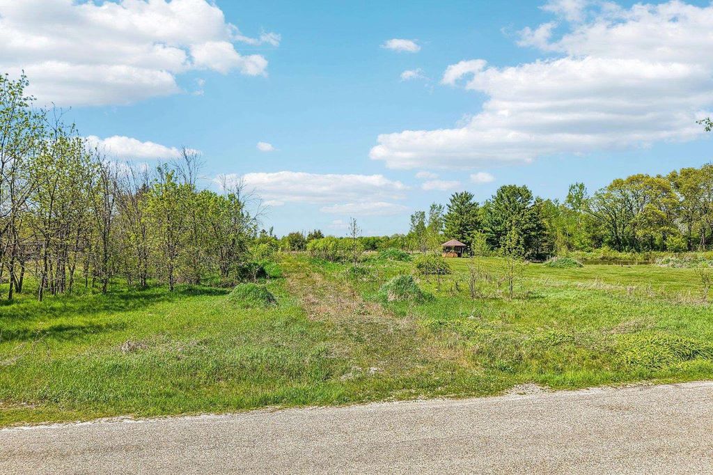 Photo of W7760 Conservation ROAD, Lake Mills, WI 53551 (MLS # 2023697)