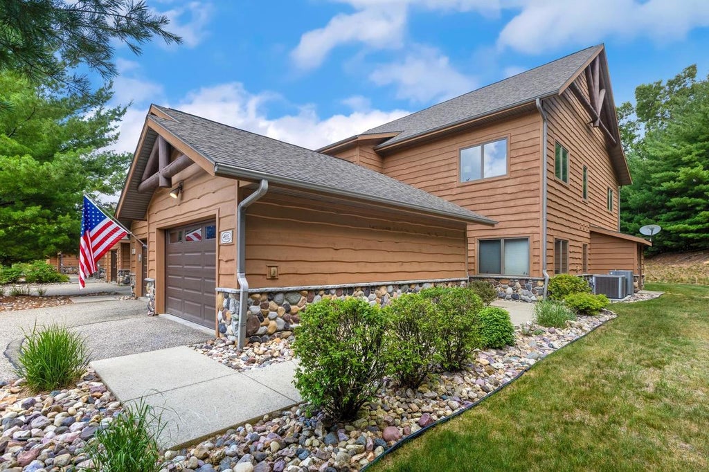 Photo of W4112 Vista DRIVE #8, Mauston, WI 53948 (MLS # 2027051)