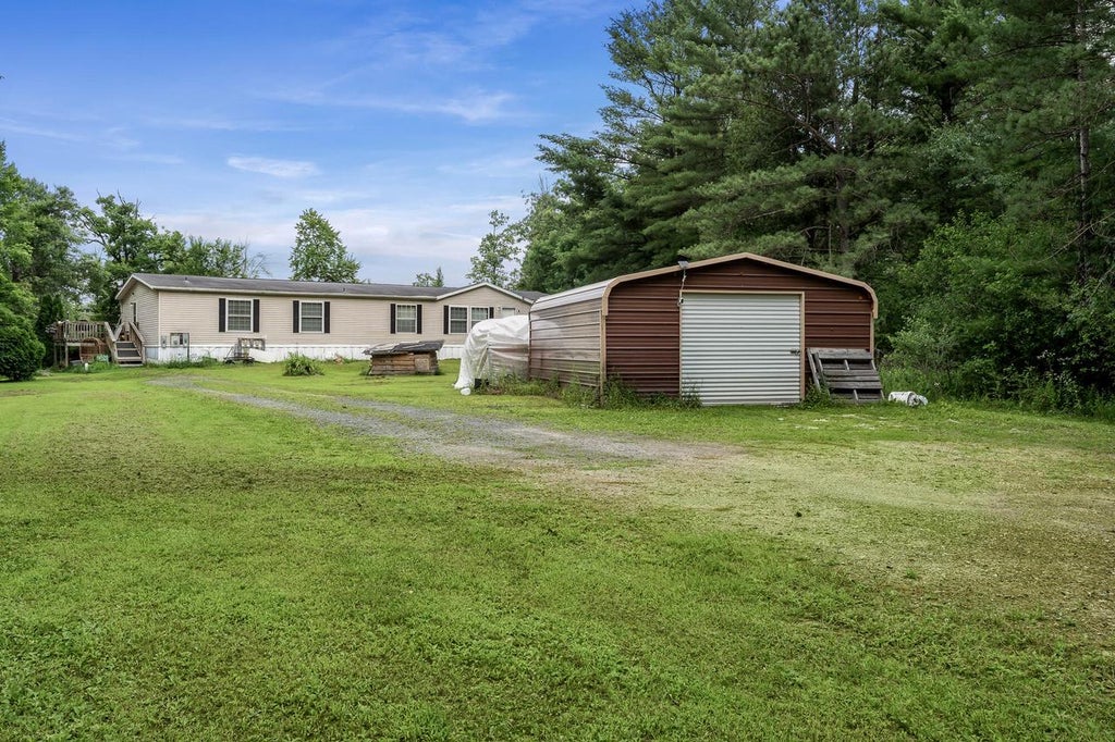 Photo of W10402 E 7th STREET, Black River Falls, WI 54615 (MLS # 1970904)