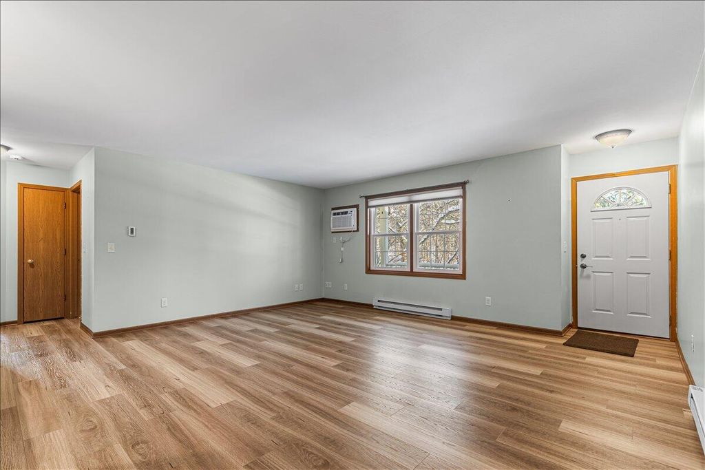 Photo of 831 Devonshire LANE #D, West Bend, WI 53090 (MLS # 1944599)