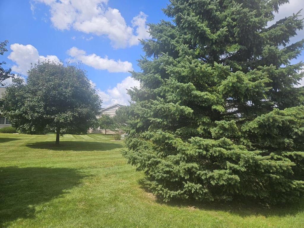 Photo of 720 Wood River COURT #4, West Bend, WI 53095 (MLS # 1949317)