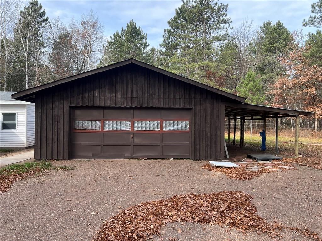 Photo of W 9302 Wright Drive, Spooner, WI 54801 (MLS # 1596808)