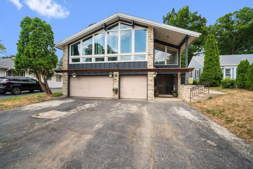 Photo of 10340 W Rogers STREET, West Allis, WI 53227 (MLS # 1973337)