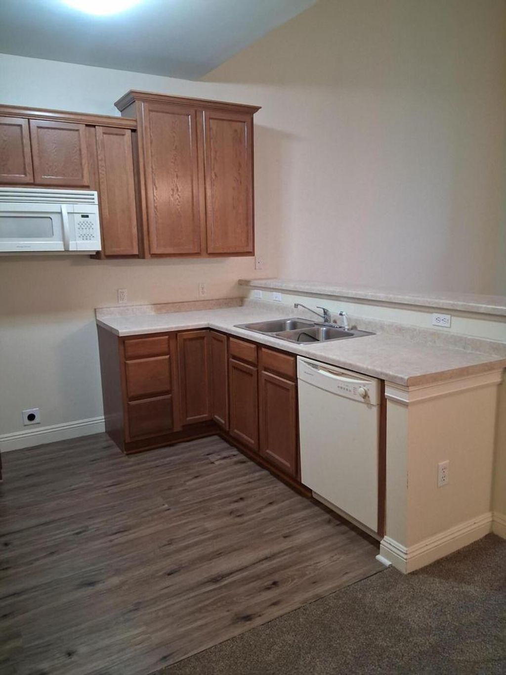 Photo of 2135 Rainbow Lake LANE #124, West Bend, WI 53090 (MLS # 1953438)