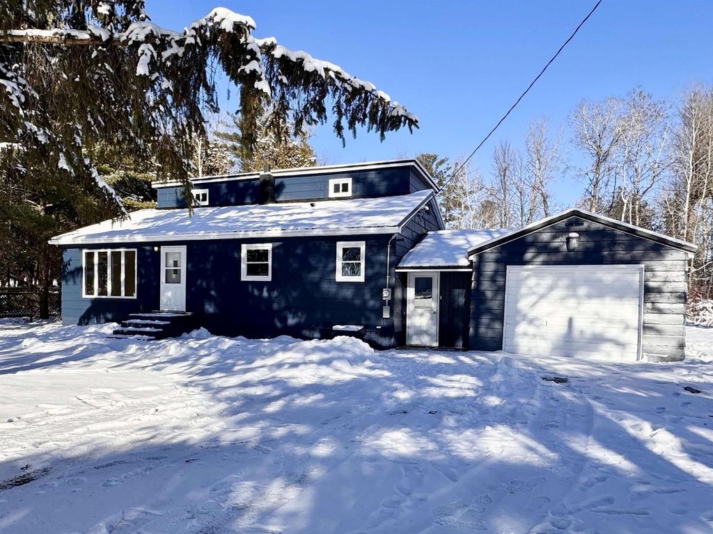 Photo of W8556 State Highway 64, Pound, WI 54161 (MLS # 50319575)