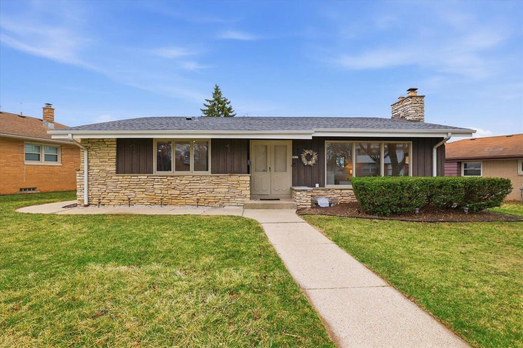 Photo of 9837 W Sarasota PLACE, Milwaukee, WI 53222 (MLS # 1956036)