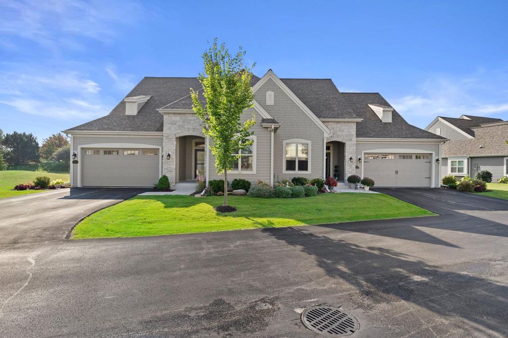 Photo of 1763 Derby LANE #67, Oconomowoc, WI 53066 (MLS # 1950898)