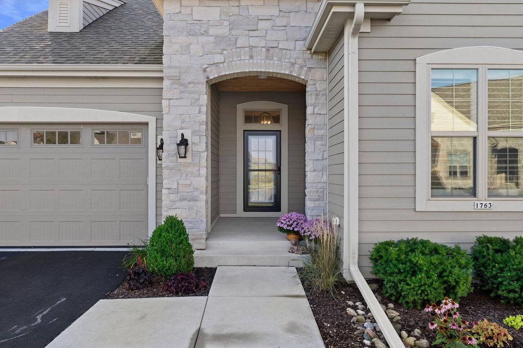 Photo of 1763 Derby LANE #67, Oconomowoc, WI 53066 (MLS # 1950898)