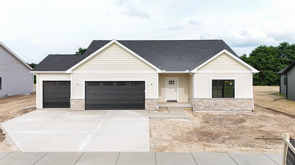 Photo of 3810 N Woodbury LANE, Janesville, WI 53545 (MLS # 2018755)