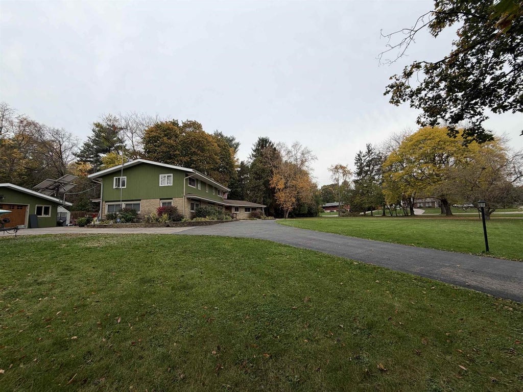 Photo of 715 N Marion AVENUE, Janesville, WI 53548 (MLS # 2035427)