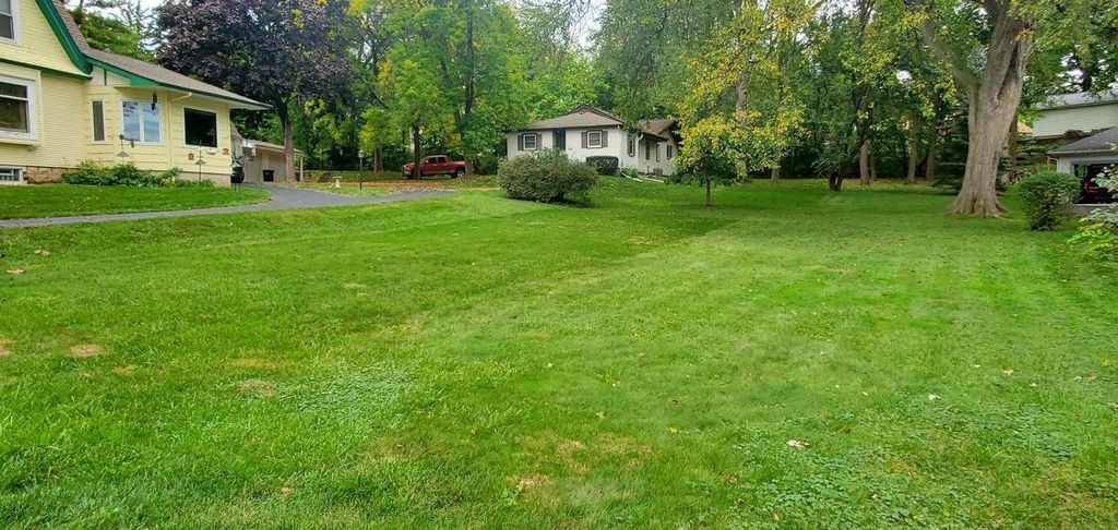 Photo of 335 W Wisconsin AVENUE, Pewaukee, WI 53072 (MLS # 1939443)