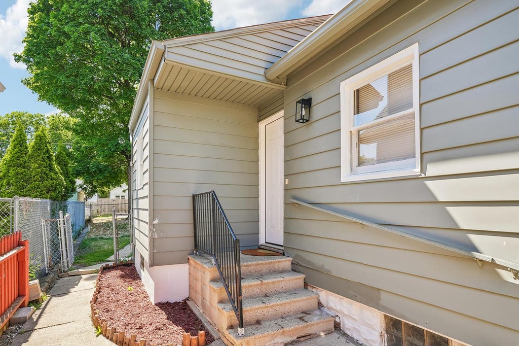 Photo of 231 S 62nd STREET, Milwaukee, WI 53214 (MLS # 1964987)