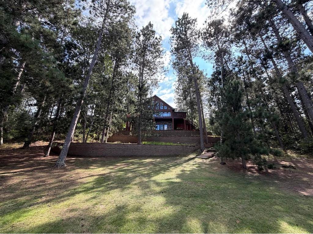 Photo of 7465 E Flowage ROAD, Minong, WI 54859 (MLS # 7138292)