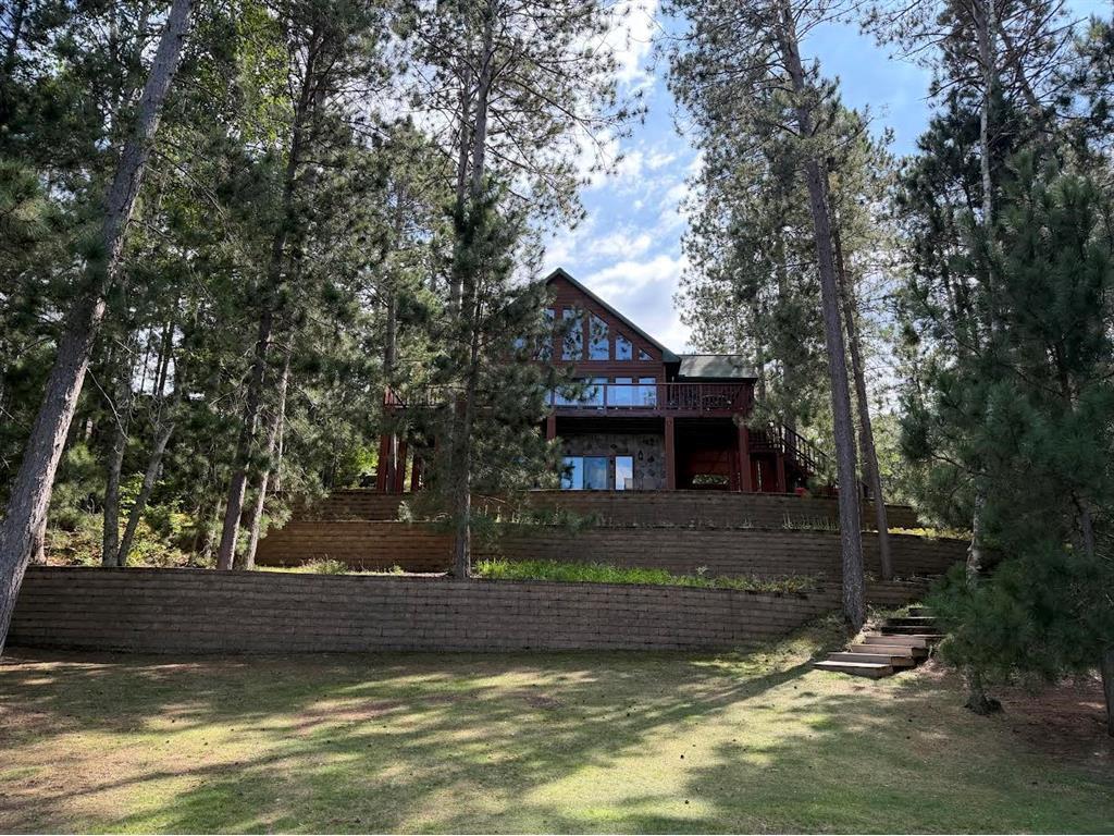 Photo of 7465 E Flowage ROAD, Minong, WI 54859 (MLS # 7138292)