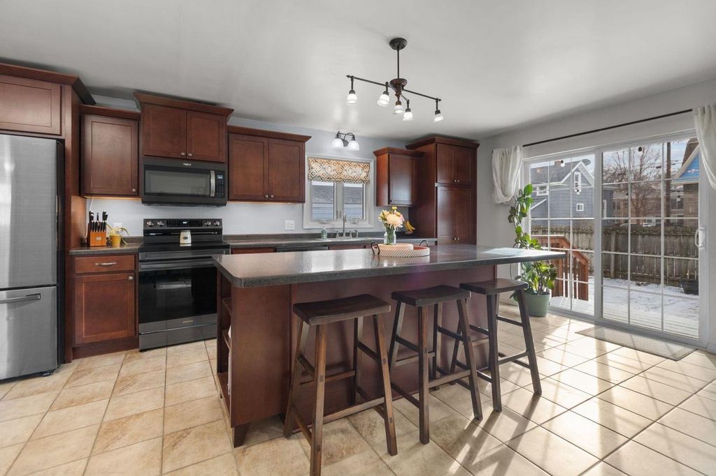 Photo of 719 W 8th AVENUE, Oshkosh, WI 54902 (MLS # 50320289)