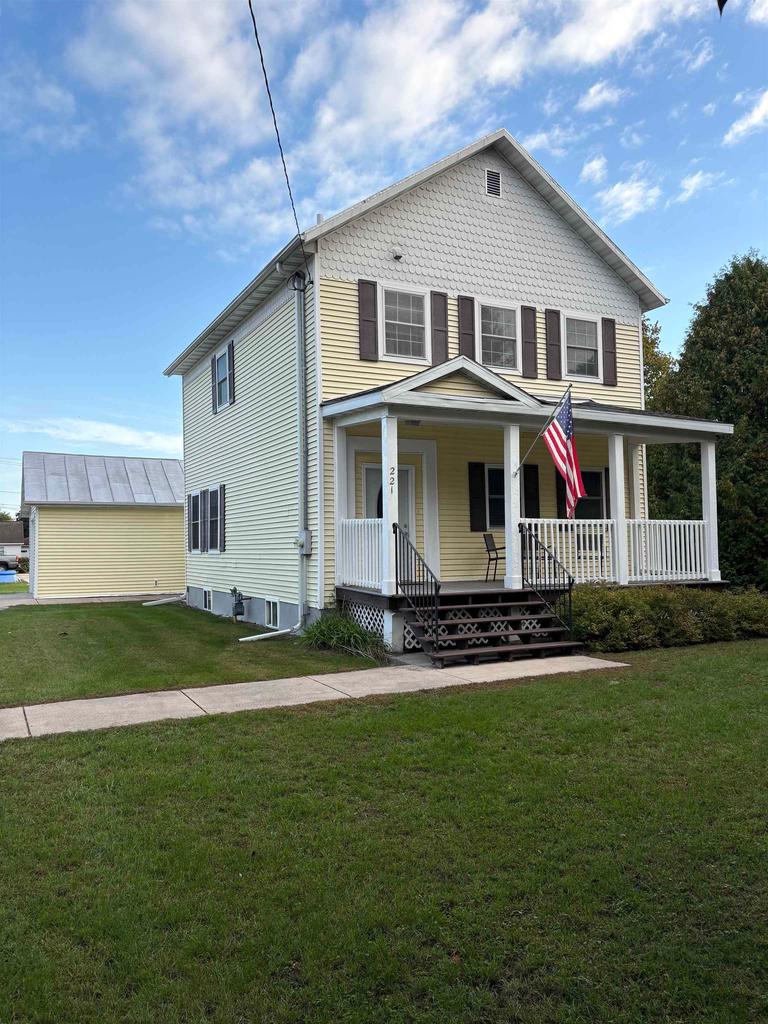 Photo of 221 Bridge STREET, Oconto, WI 54153 (MLS # 50333372)