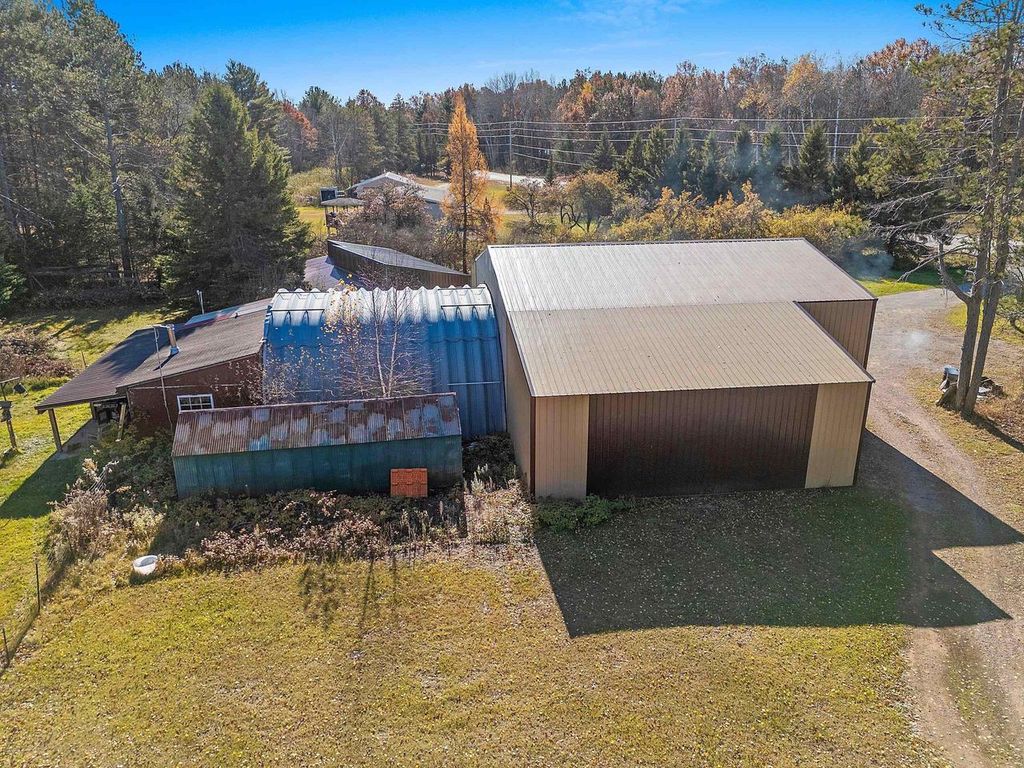 Photo of N4890 State Highway 180, Marinette, WI 54153 (MLS # 50317762)