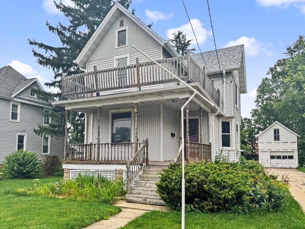 Photo of 139 W Oak Grove STREET, Juneau, WI 53039 (MLS # 1977314)
