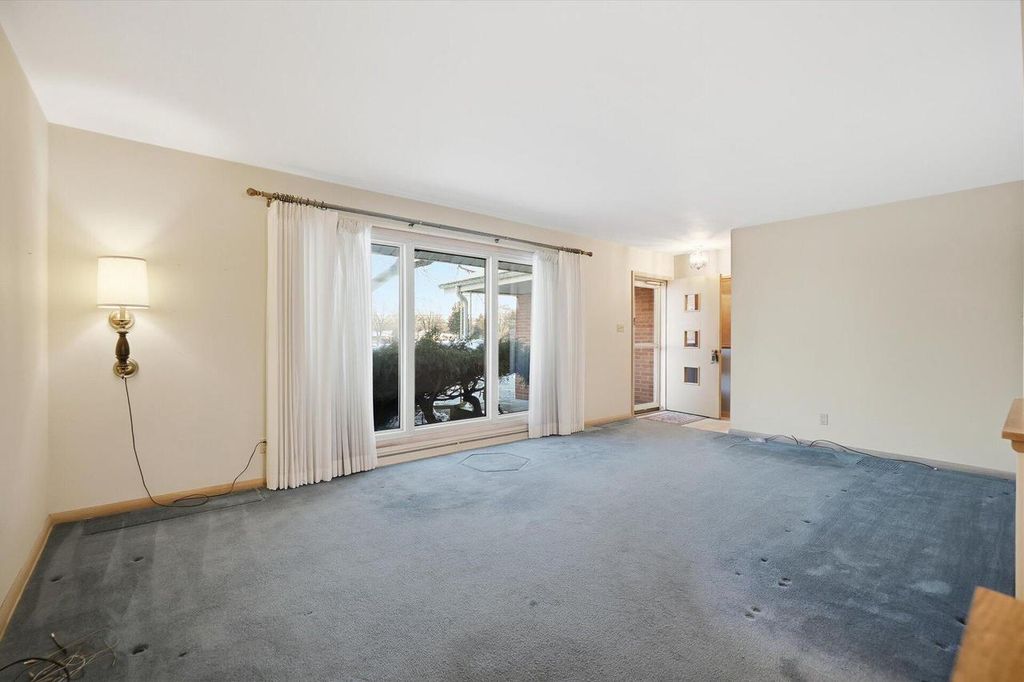 Photo of N72W15292 Patio COURT, Menomonee Falls, WI 53051 (MLS # 1946402)