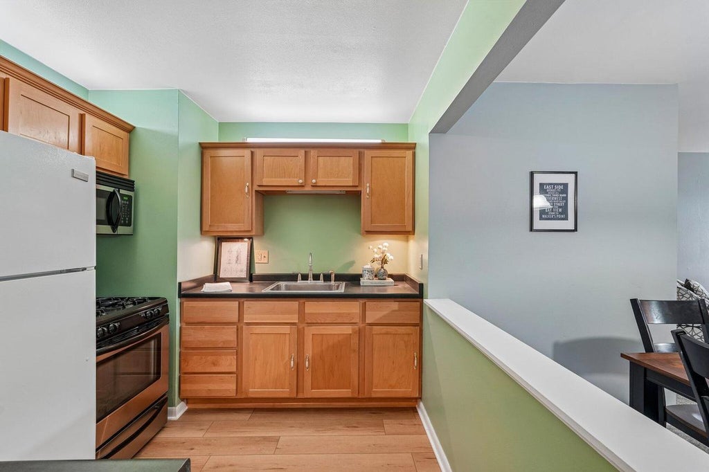 Photo of 2025 E Greenwich AVENUE #106, Milwaukee, WI 53211 (MLS # 1964654)