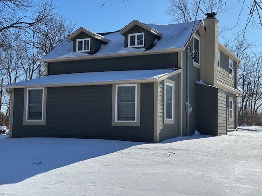 Photo of N64W21021 Mill ROAD, Menomonee Falls, WI 53051 (MLS # 1946260)