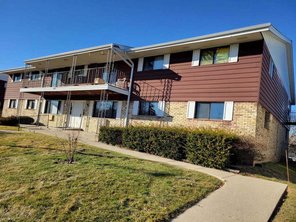 Photo of 8322 W Howard AVENUE #2, Milwaukee, WI 53220 (MLS # 1953238)