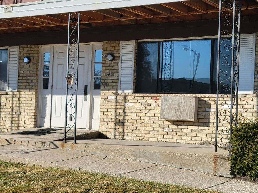 Photo of 8322 W Howard AVENUE #2, Milwaukee, WI 53220 (MLS # 1953238)