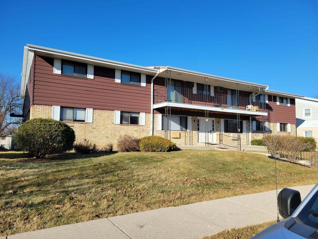 Photo of 8322 W Howard AVENUE #2, Milwaukee, WI 53220 (MLS # 1953238)