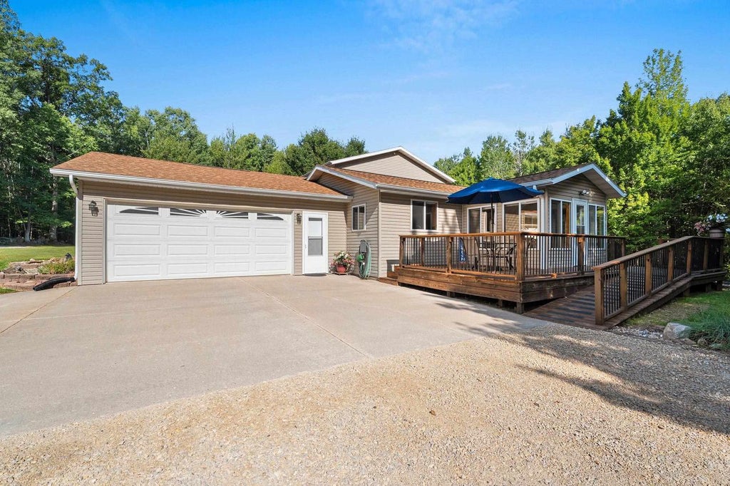 Photo of W10614 Benson Lake ROAD, Amberg, WI 54102 (MLS # 50331882)