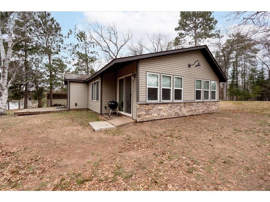 Photo of W7029 Old Bass Lake ROAD, Minong, WI 54859 (MLS # 7072375)