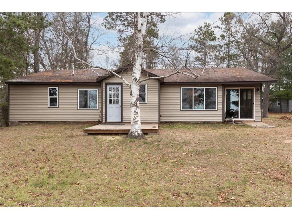Photo of W7029 Old Bass Lake ROAD, Minong, WI 54859 (MLS # 7072375)