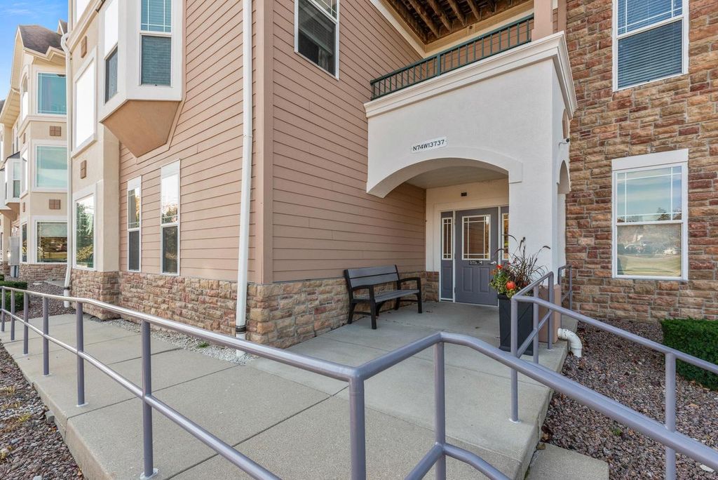 Photo of N74W13737 Appleton AVENUE #107, Menomonee Falls, WI 53051 (MLS # 1940741)