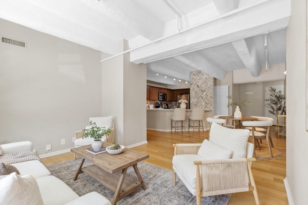 Photo of 270 E Highland AVENUE #113, Milwaukee, WI 53202 (MLS # 1979743)