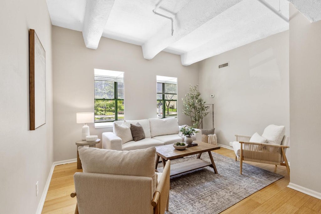 Photo of 270 E Highland AVENUE #113, Milwaukee, WI 53202 (MLS # 1979743)