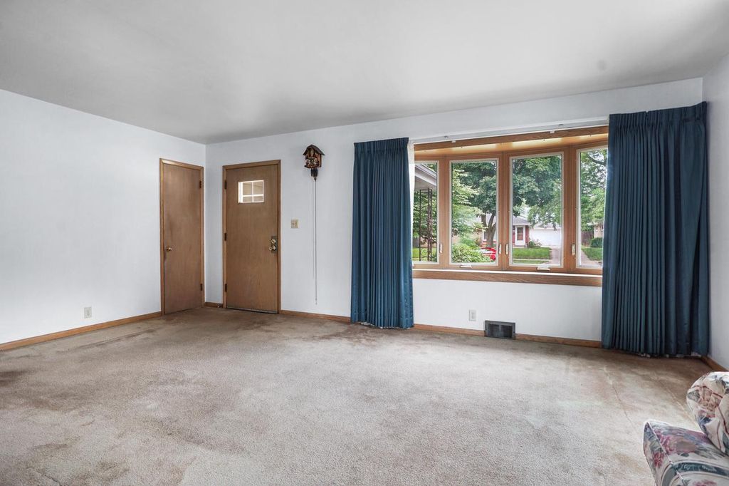 Photo of 10413 W Sheridan AVENUE, Milwaukee, WI 53225 (MLS # 1946107)