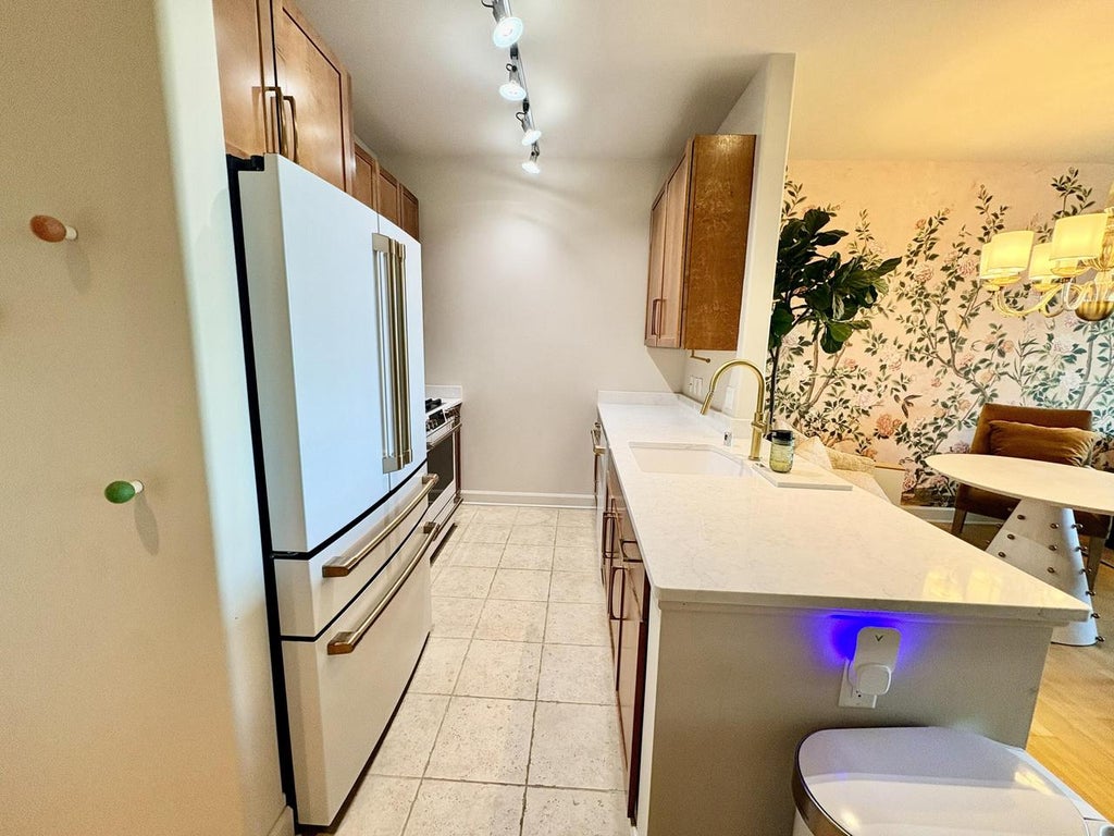 Photo of 1550 E Royall PLACE #410, Milwaukee, WI 53202 (MLS # 1982516)