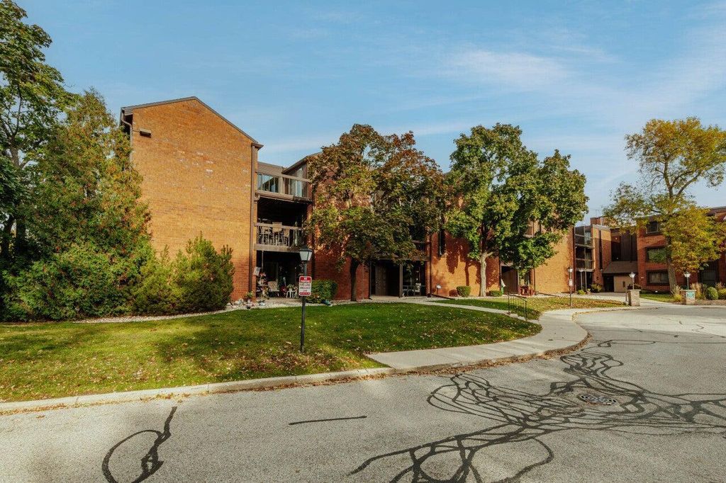 Photo of 5200 S Tuckaway BOULEVARD SOUTH BOULEVARD S #111, Greenfield, WI 53221 (MLS # 1954721)